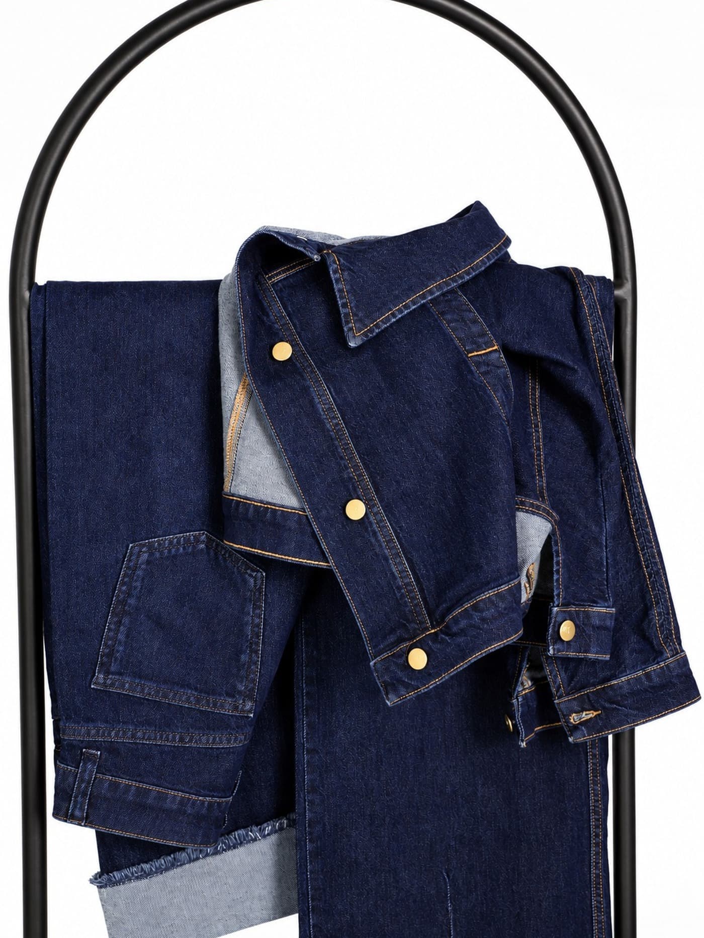 denim jacket draped on a stand
