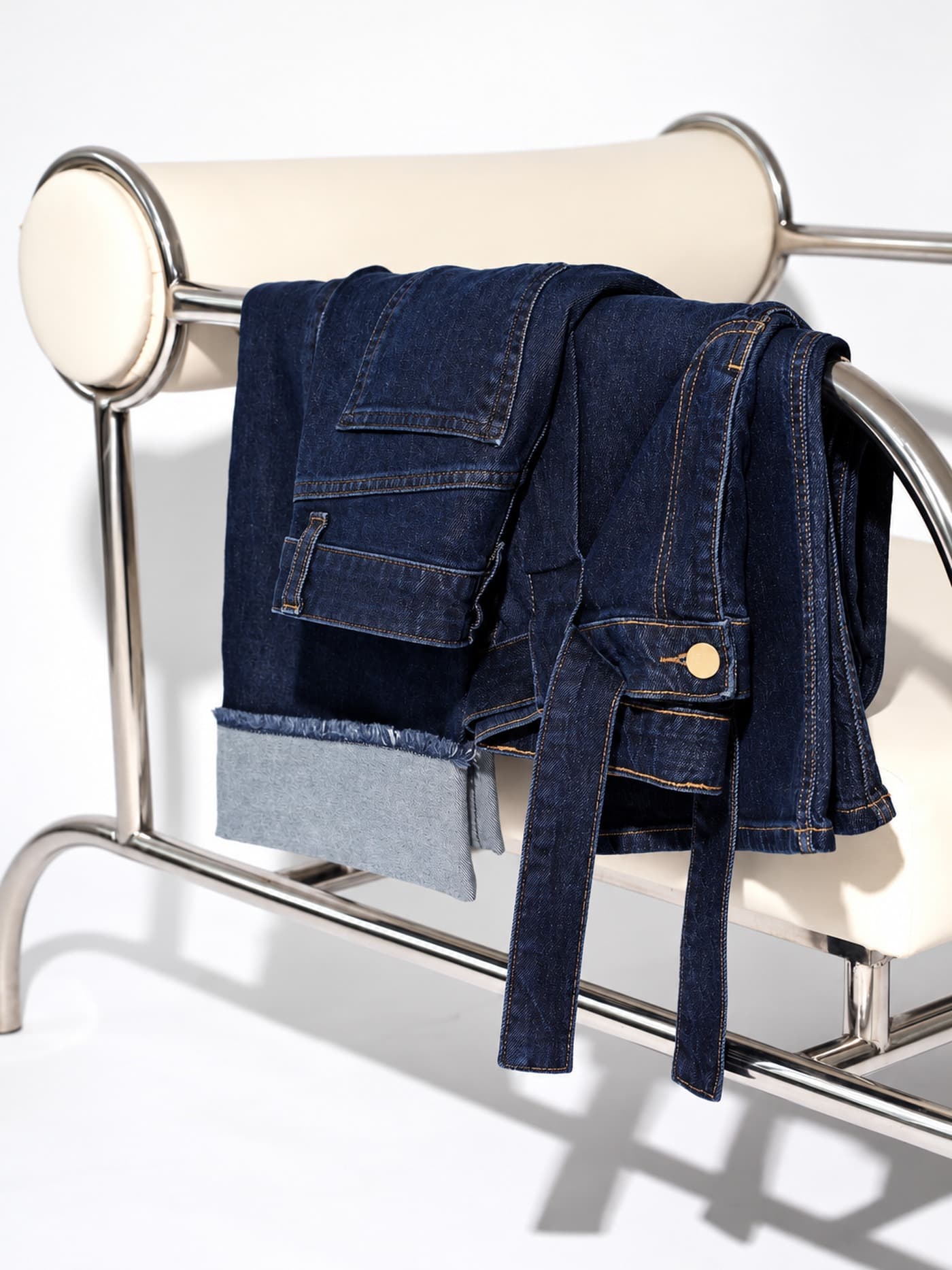 folded jeans on a chair